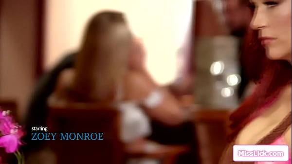 Milf licks a blonde in a public restroom