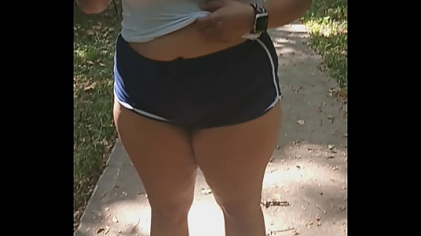 FreckleFace420 flashes her naked body in a public park