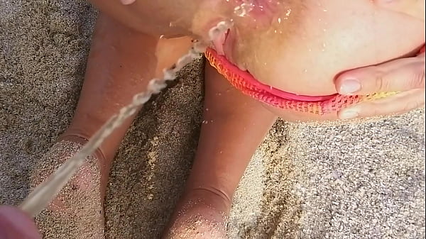 Hot Hairy Milf Pees On Guy At The Beach and Gets Her Asshole Pissed