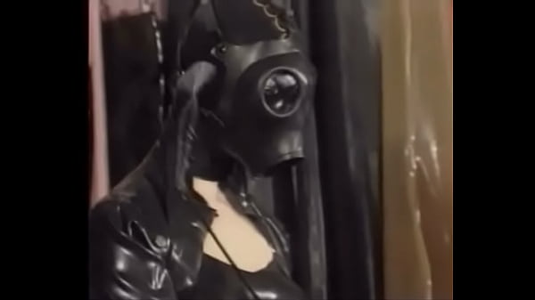 Natalia Muehlhausen latex slave in hood and gasmask gets a good fuck from her master (from ‘Gummi in der Ehe’)