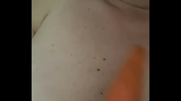 Blonde fucking a carrott