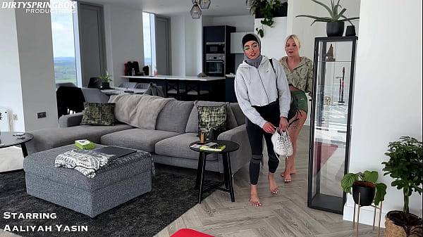 Emily shows Muslim Aaliyah Yasin how to relax after gym